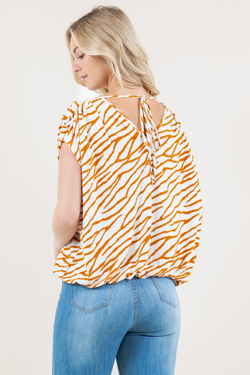 EXT SLEEVE DOLMAN SURPLICE BUBBLE BACK TIE TOP