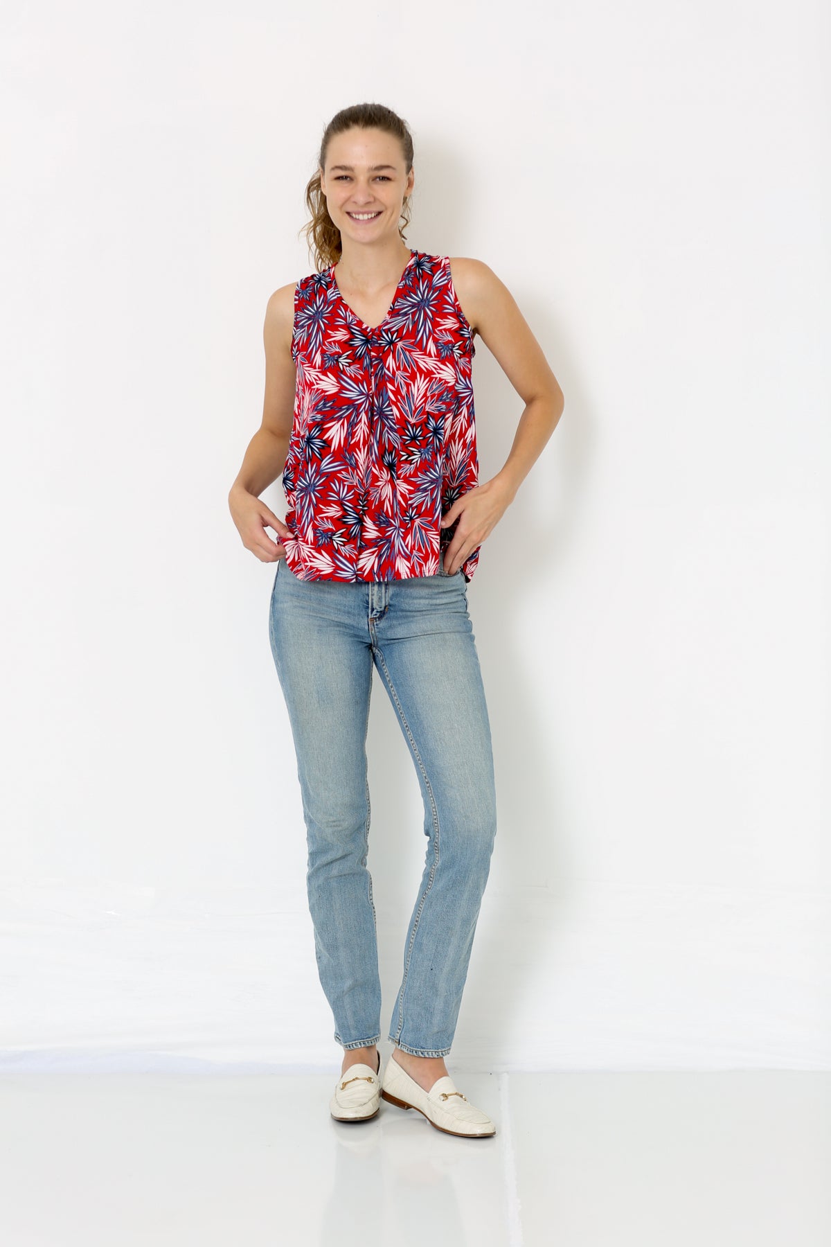 SLEEVELESS HIGH LOW TOP WITH LACE UP BACK TRIM - T8080-PE-SL-701764