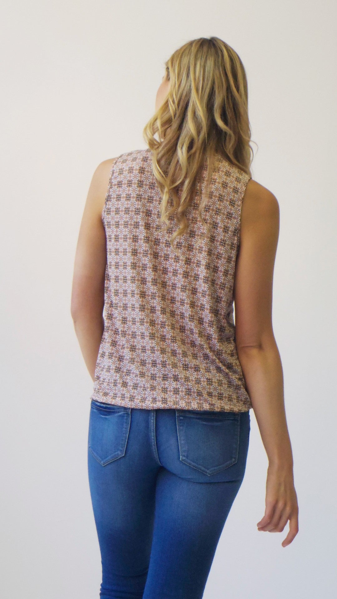 Sleeveless Smocked front yoke